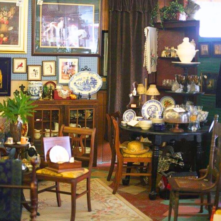 Antique furniture, framed art, and plates at Bohemianville Antiques