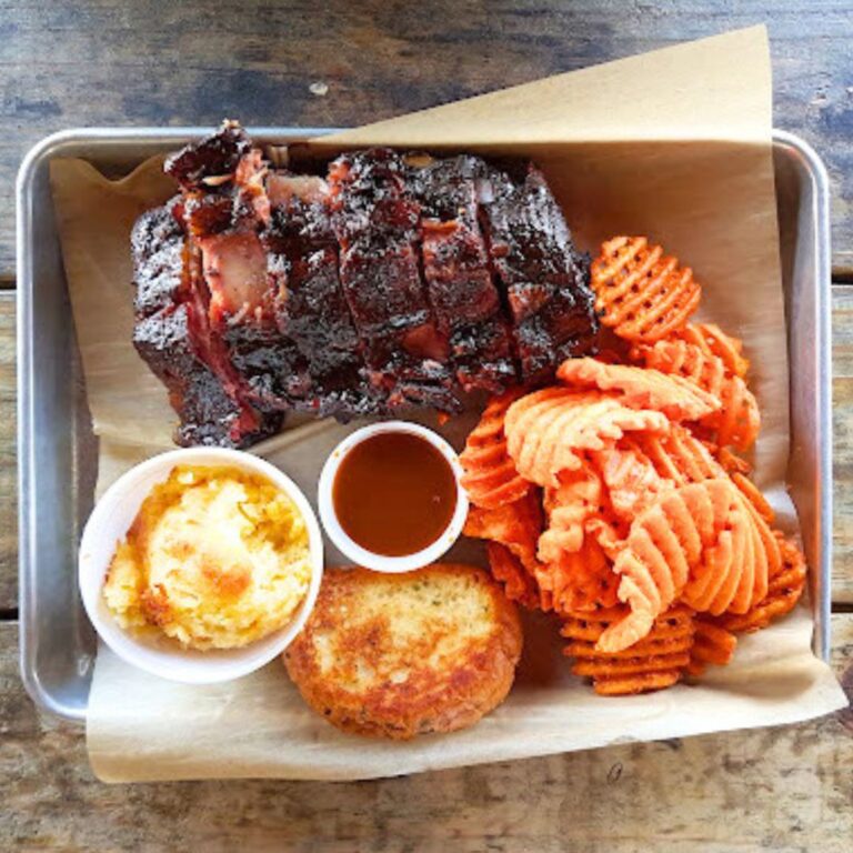 A tray of bbq food for The Francis Smokehouse