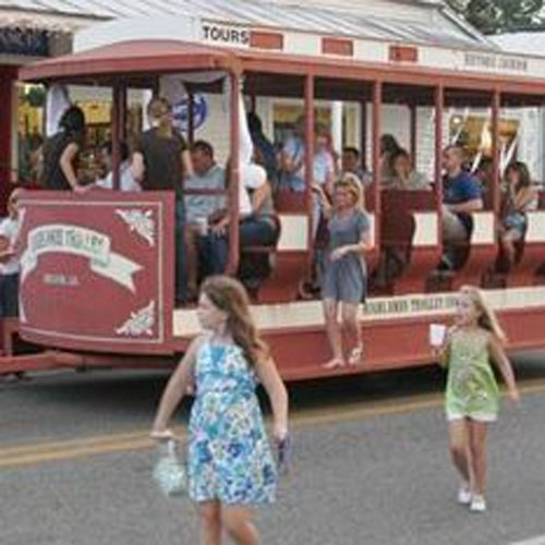 Kids on and around a trolley