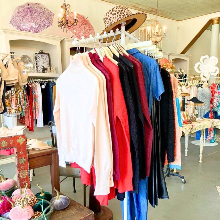 Interior of a shop with clothes on display at La Vie Boutique