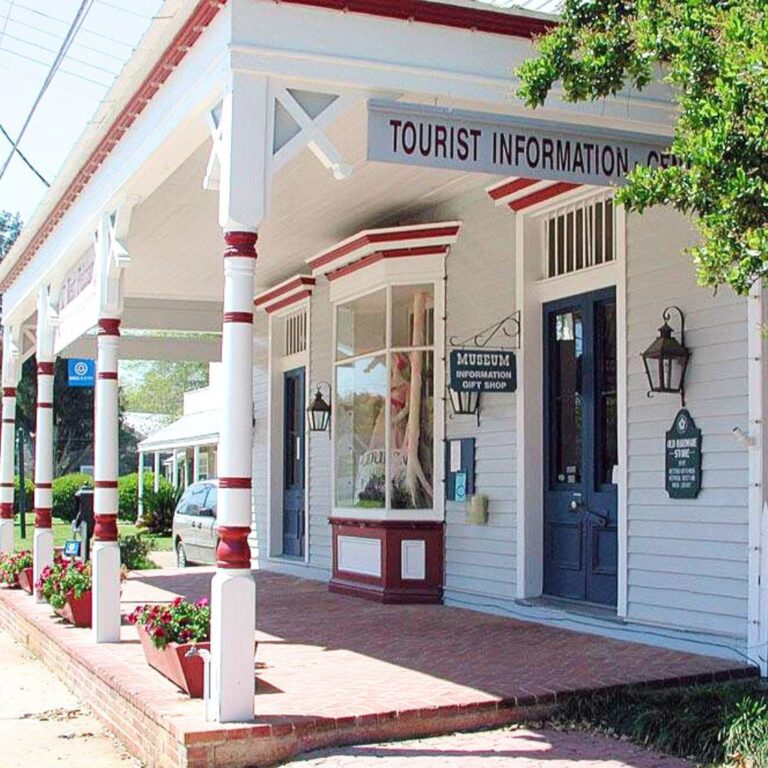 Exterior of West Feliciana Historical Society Museum Gift Shop with a tourist information sign